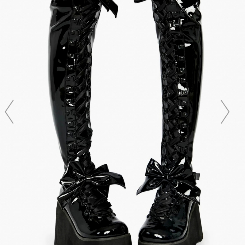 Black Patent thigh high boots from Dolls Kill, size 9. Brand is Demonia.